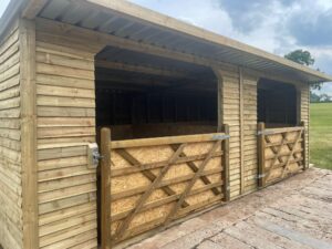 24x12 double open front timber gates lined